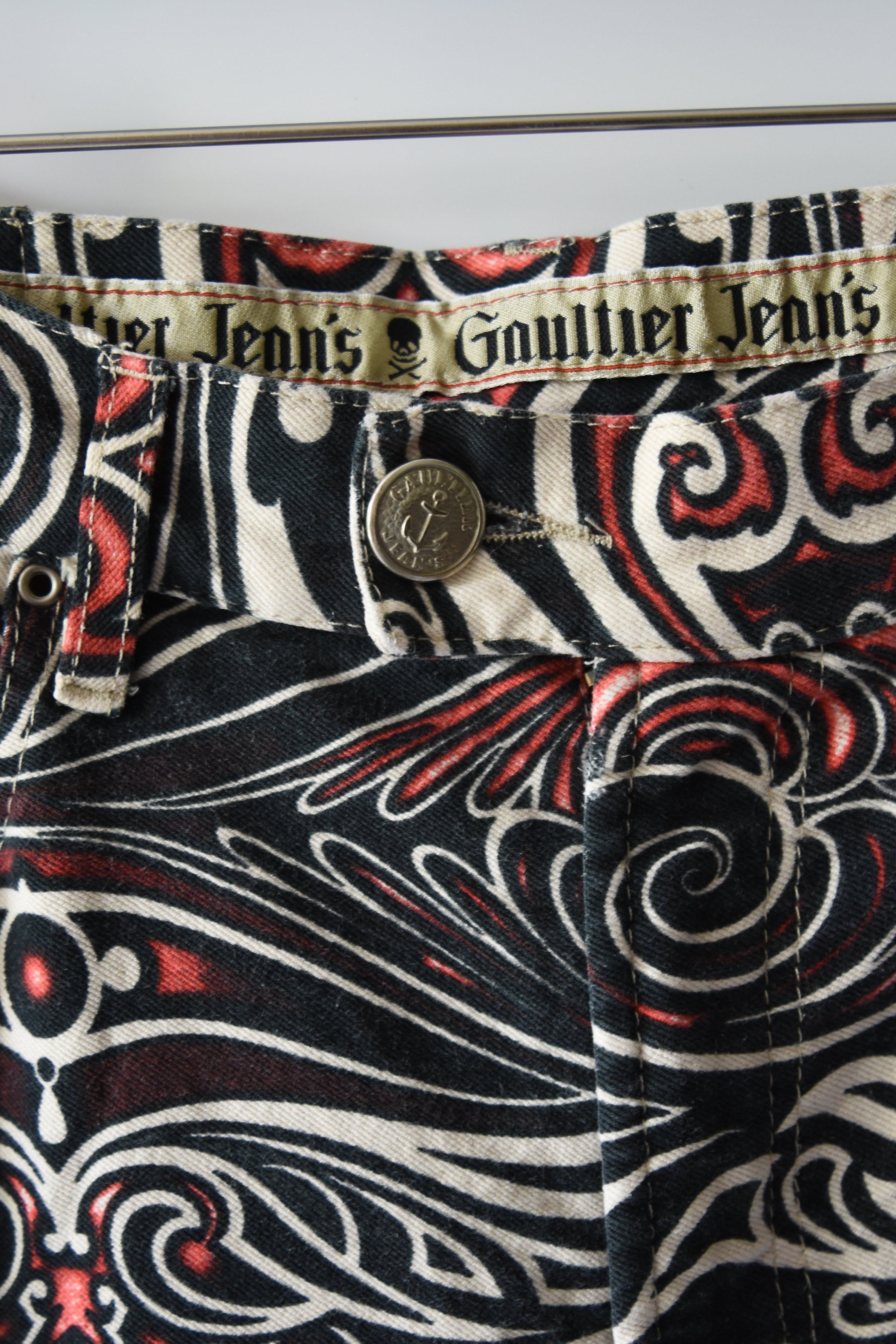 Jean Paul Gaultier Jeans Tribal Print Flared Trousers (Gothic Tattoo Swirl in Black–Red–Ivory)