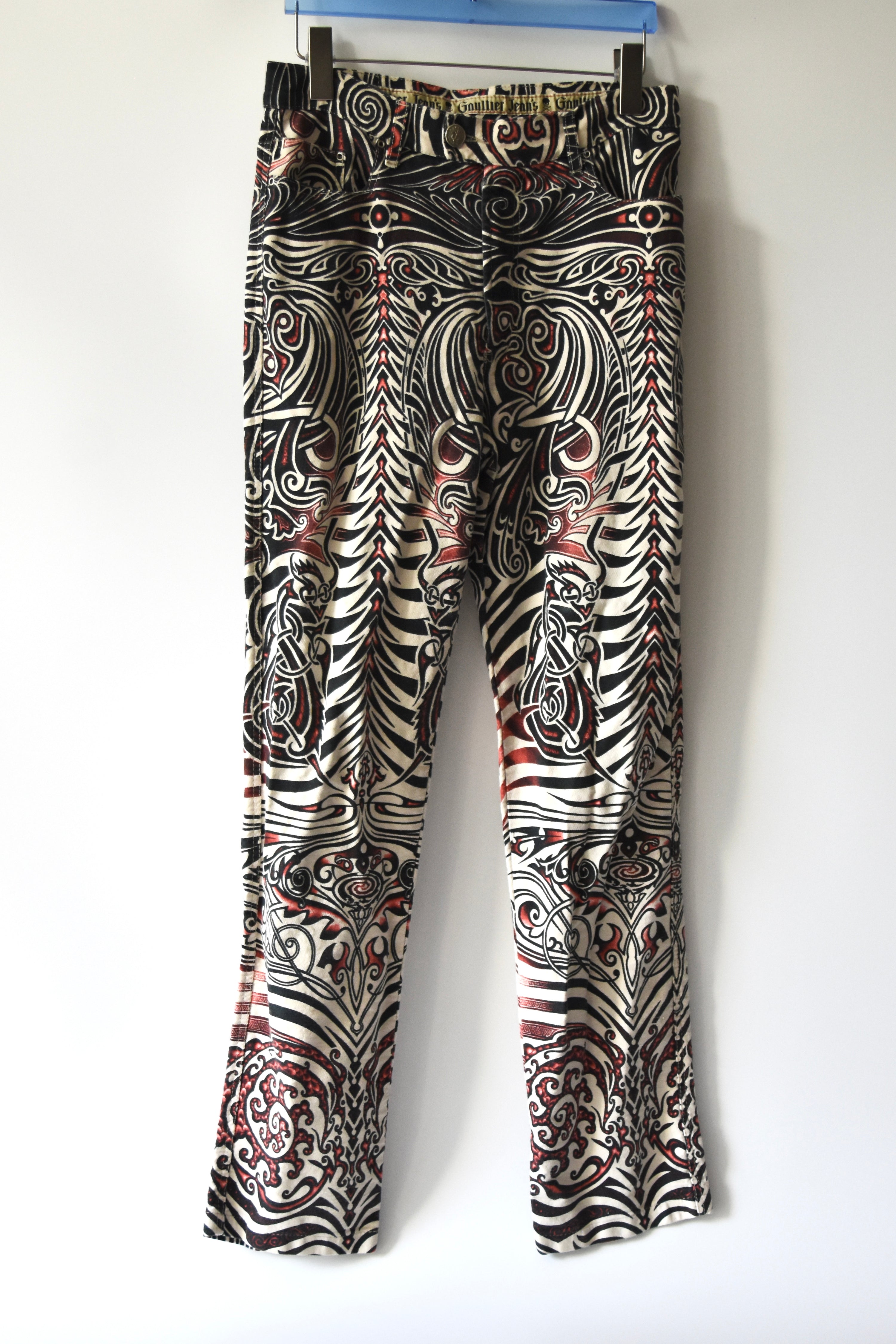 Jean Paul Gaultier Jeans Tribal Print Flared Trousers (Gothic Tattoo Swirl in Black–Red–Ivory)