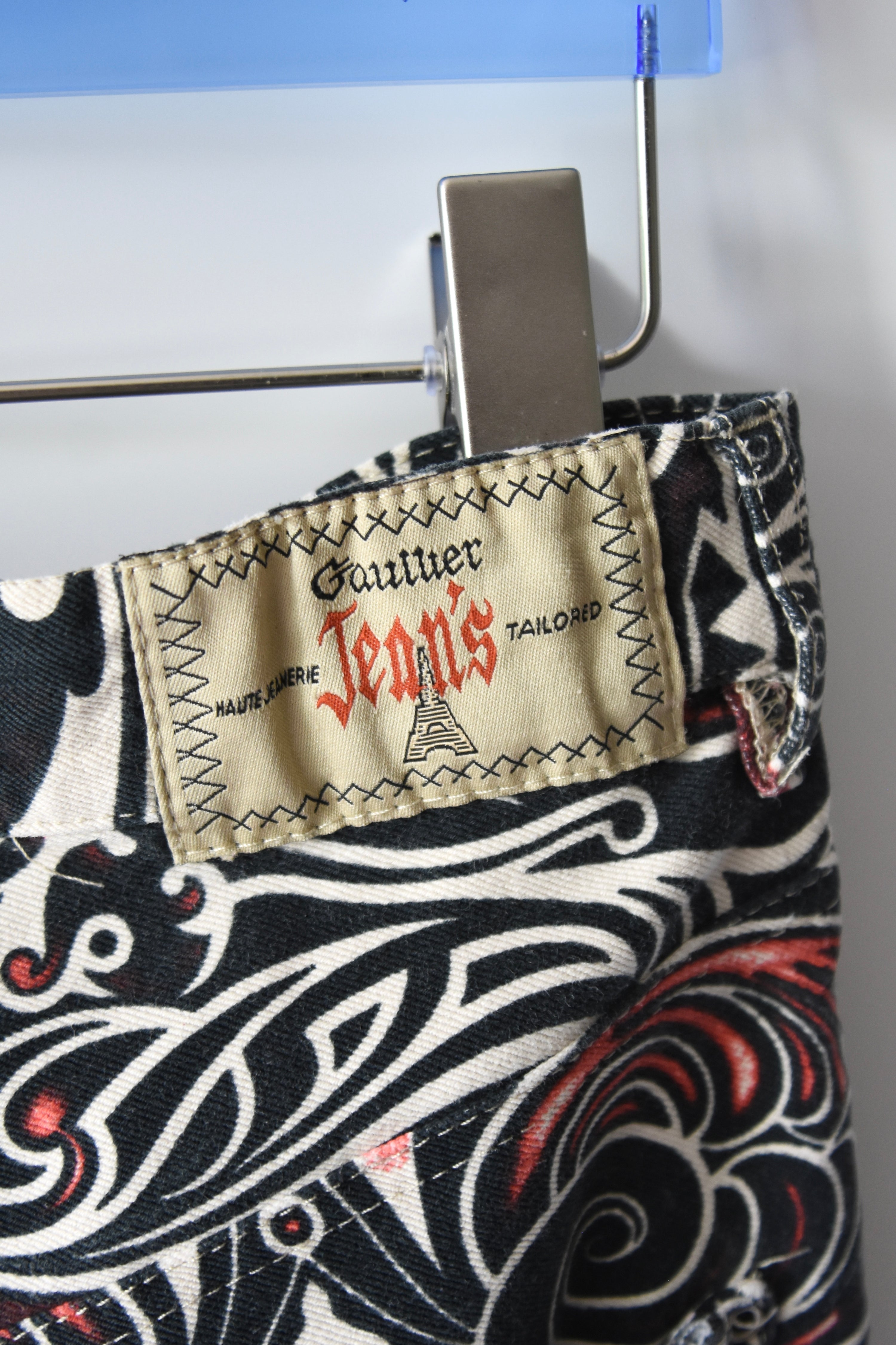 Jean Paul Gaultier Jeans Tribal Print Flared Trousers (Gothic Tattoo Swirl in Black–Red–Ivory)