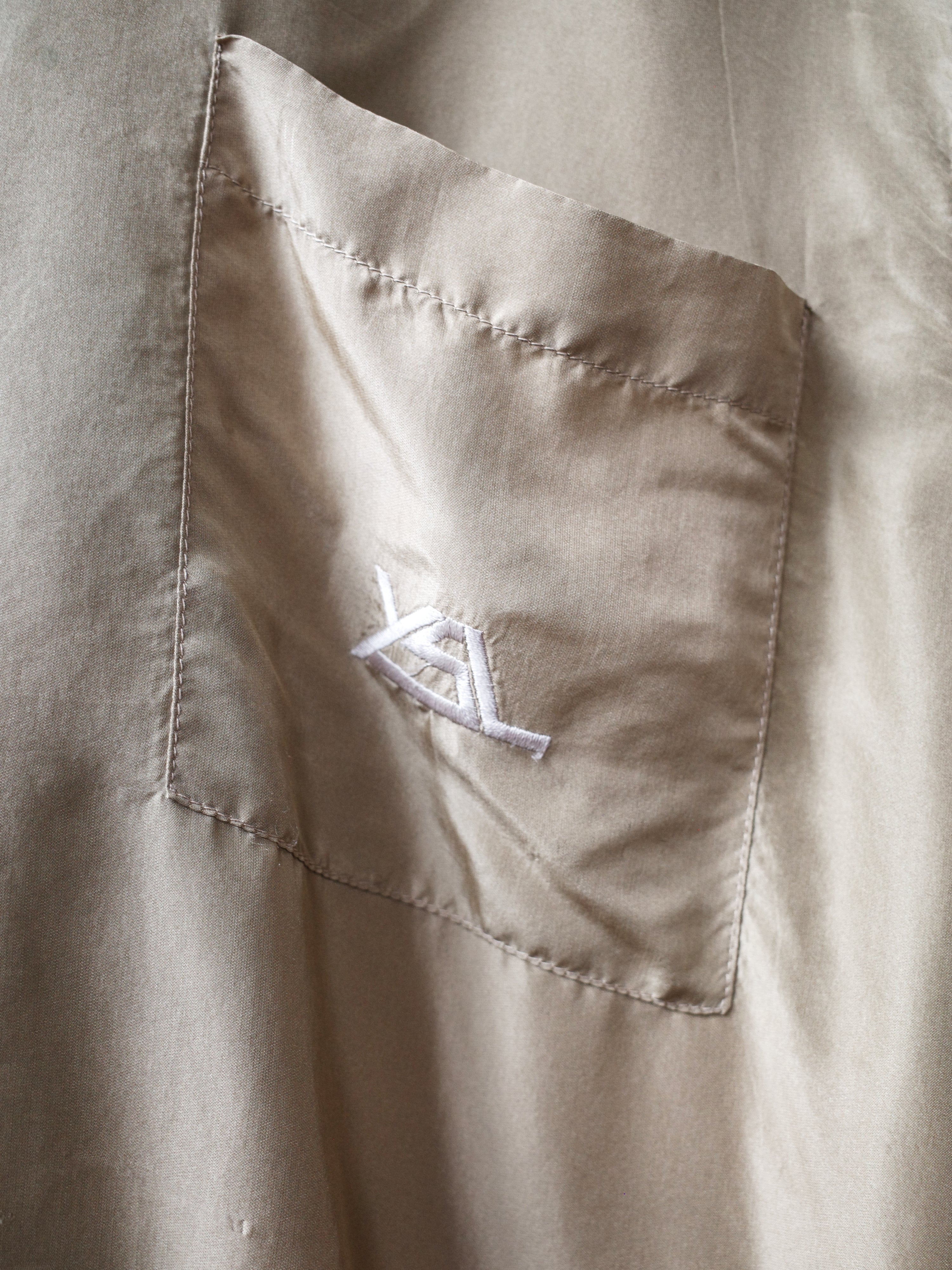 Yves Saint Laurent Deconstructed Gold Polo Shirt