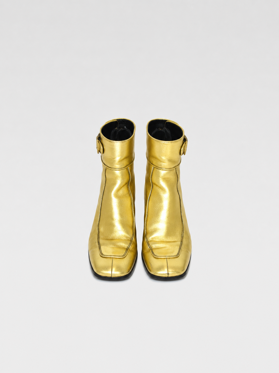 Saint Laurent Gold Sculpted Leather Ankle Boots