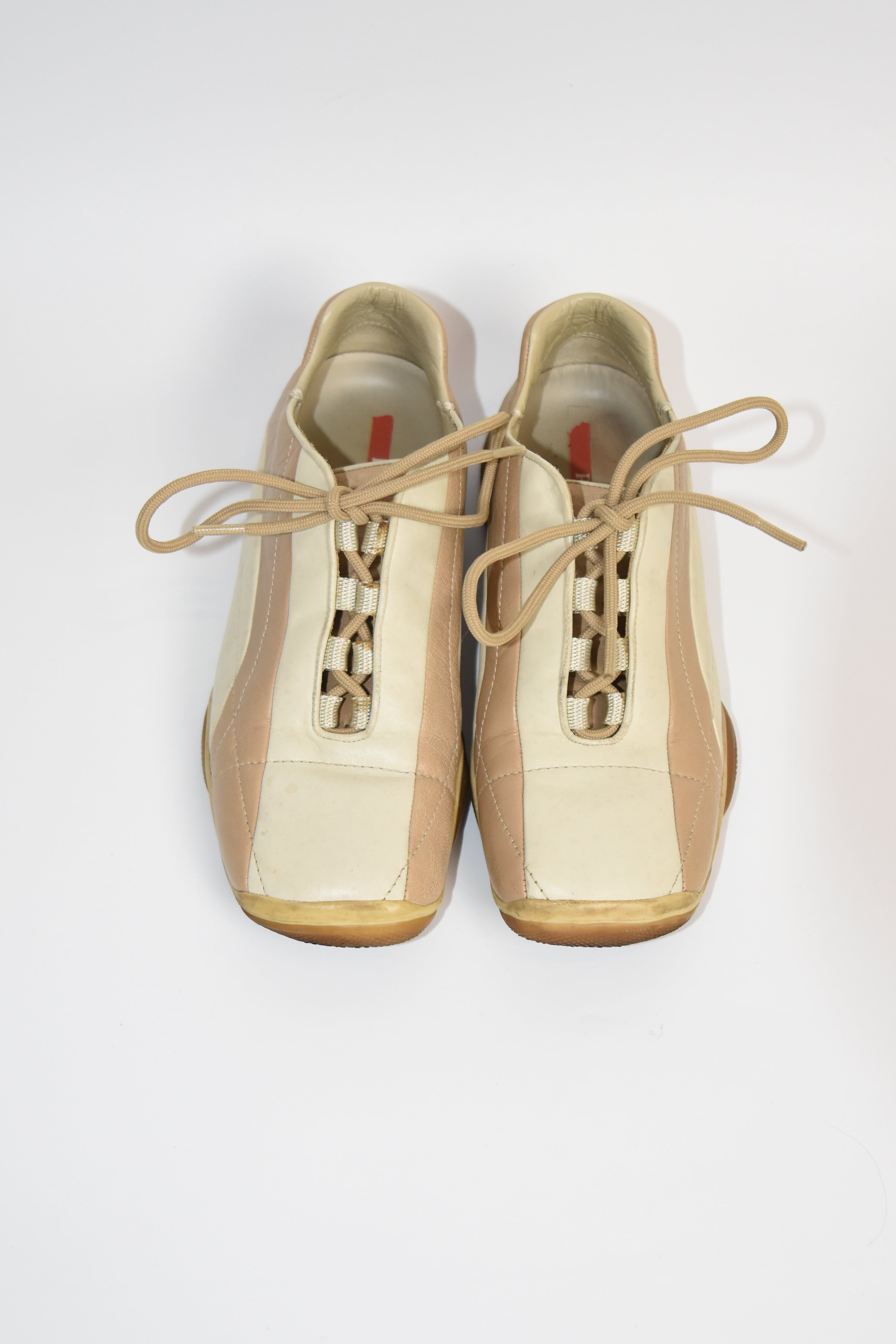PRADA Beige & Cream Leather Lace-Up Low Sneakers with Red Tab Detail (Classic Sporty Silhouette)