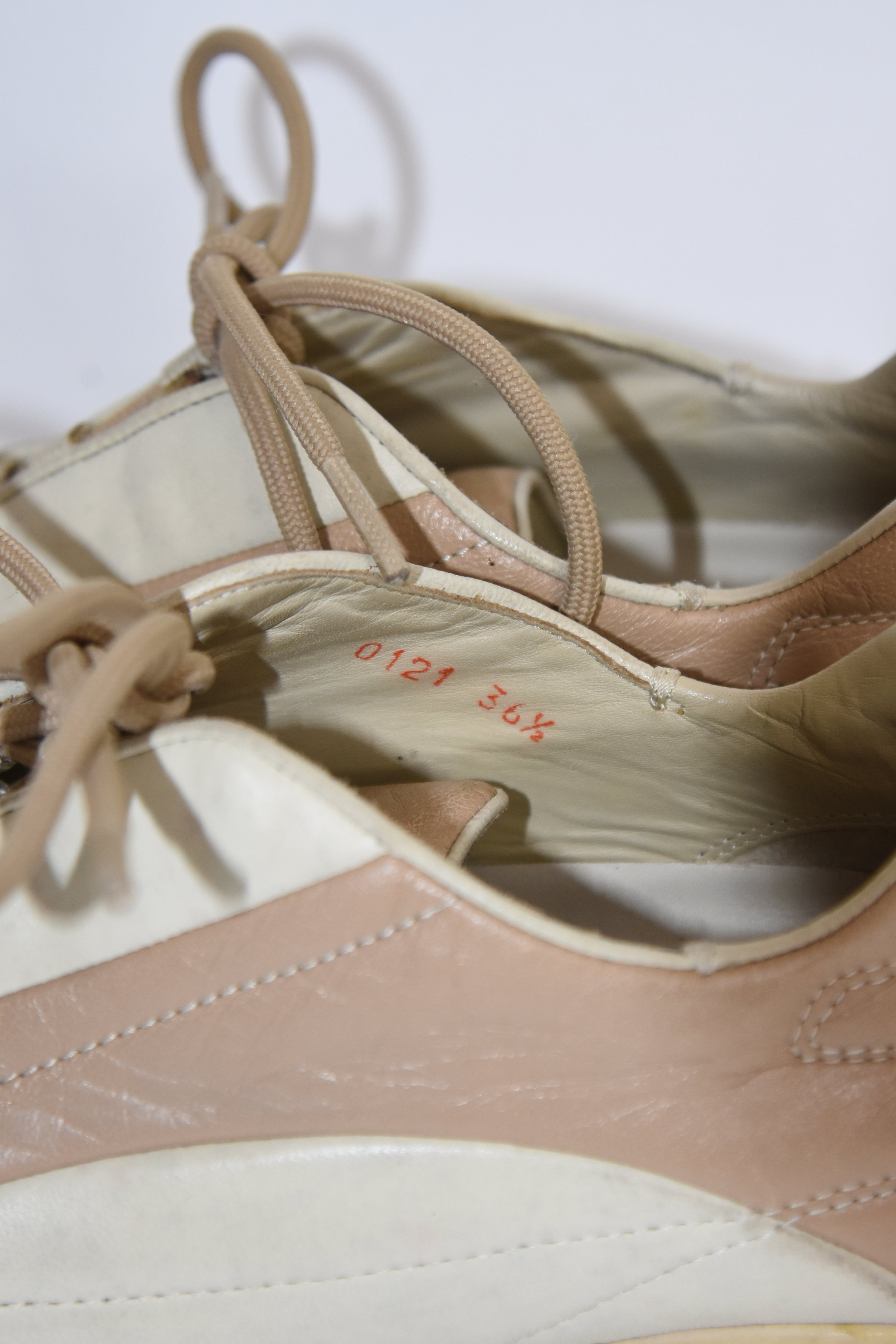 PRADA Beige & Cream Leather Lace-Up Low Sneakers with Red Tab Detail (Classic Sporty Silhouette)