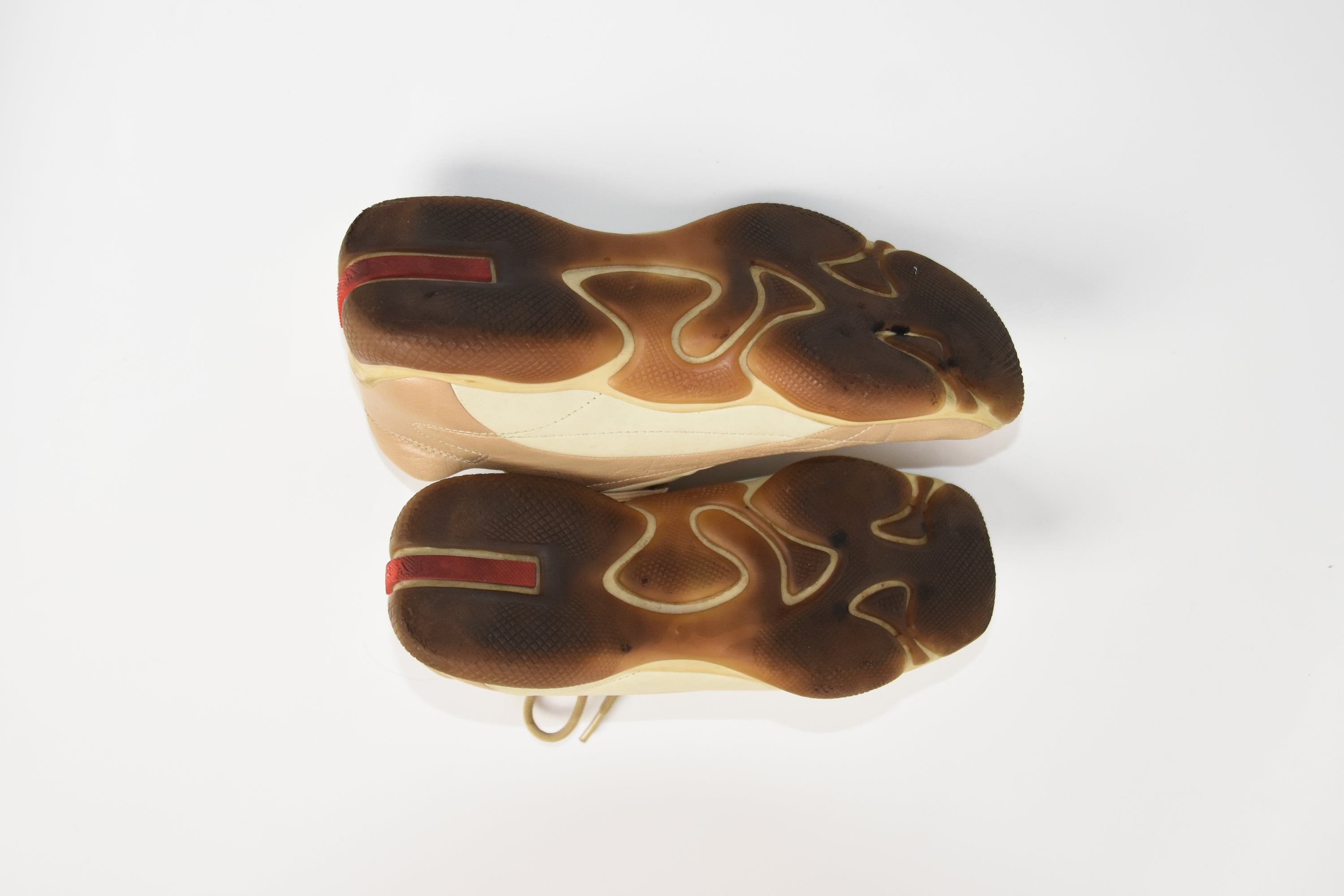 PRADA Beige & Cream Leather Lace-Up Low Sneakers with Red Tab Detail (Classic Sporty Silhouette)