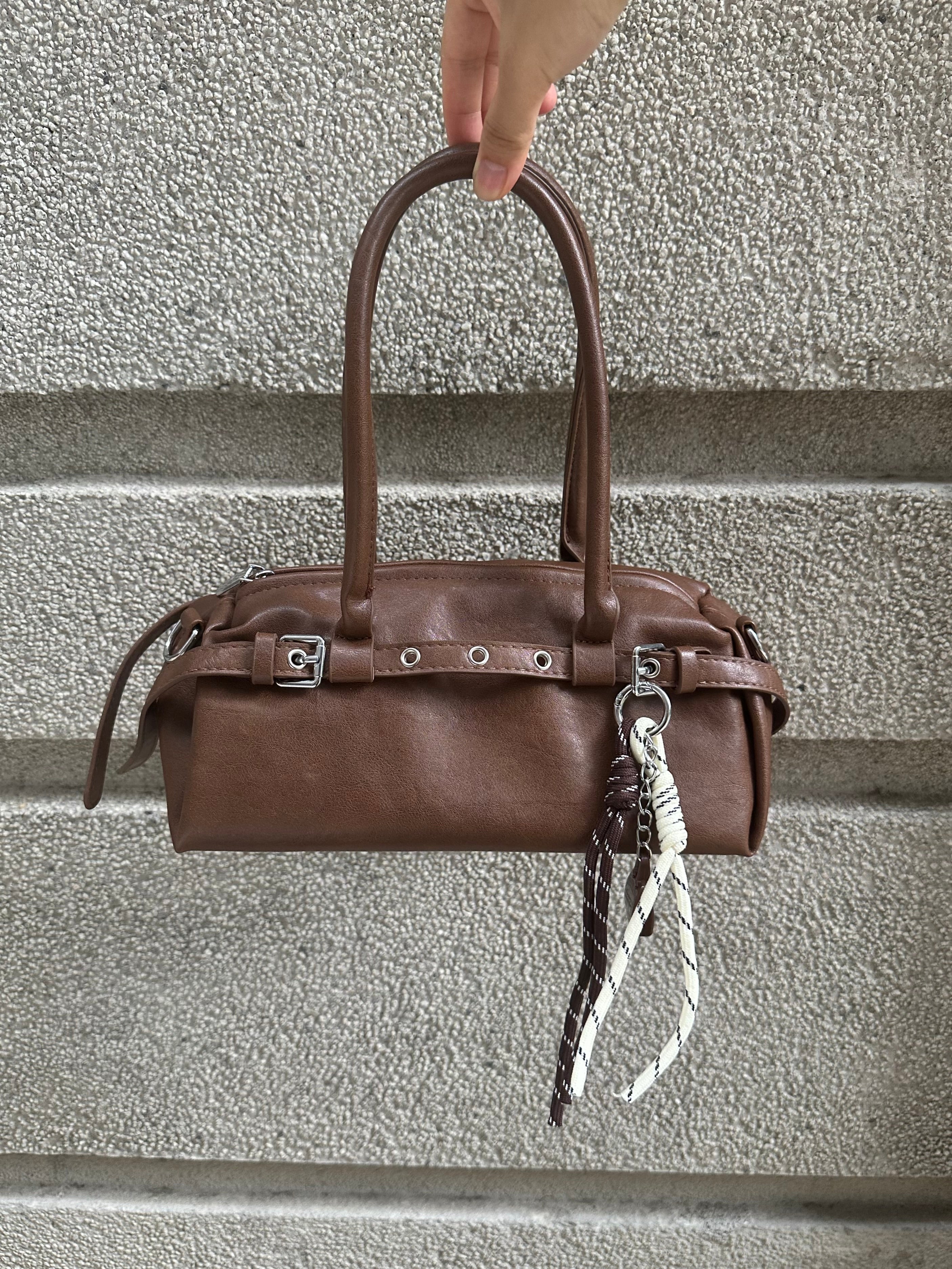 Brown Leather Buckle-Detail Handbag with Rope Charm