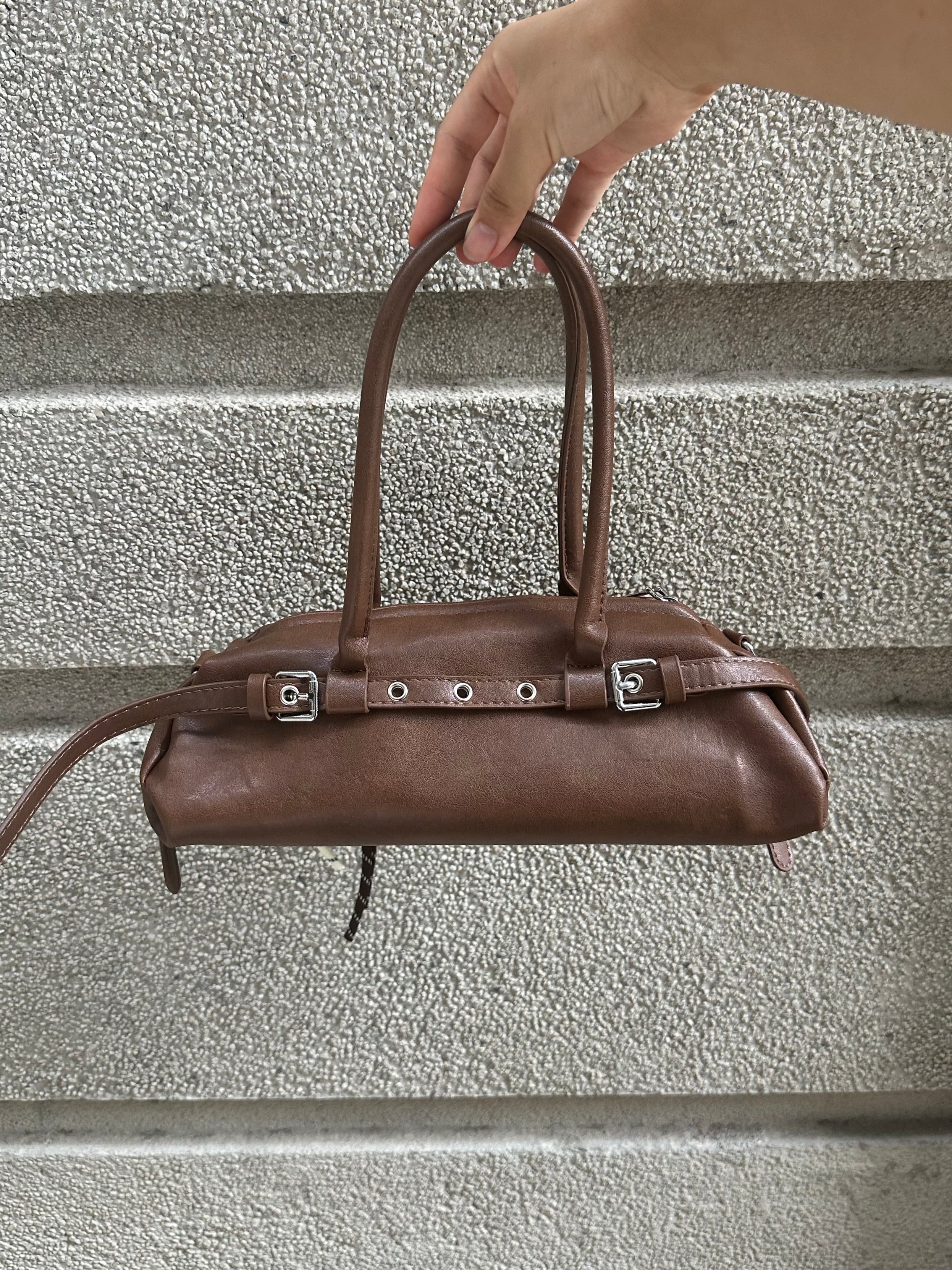 Brown Leather Buckle-Detail Handbag with Rope Charm