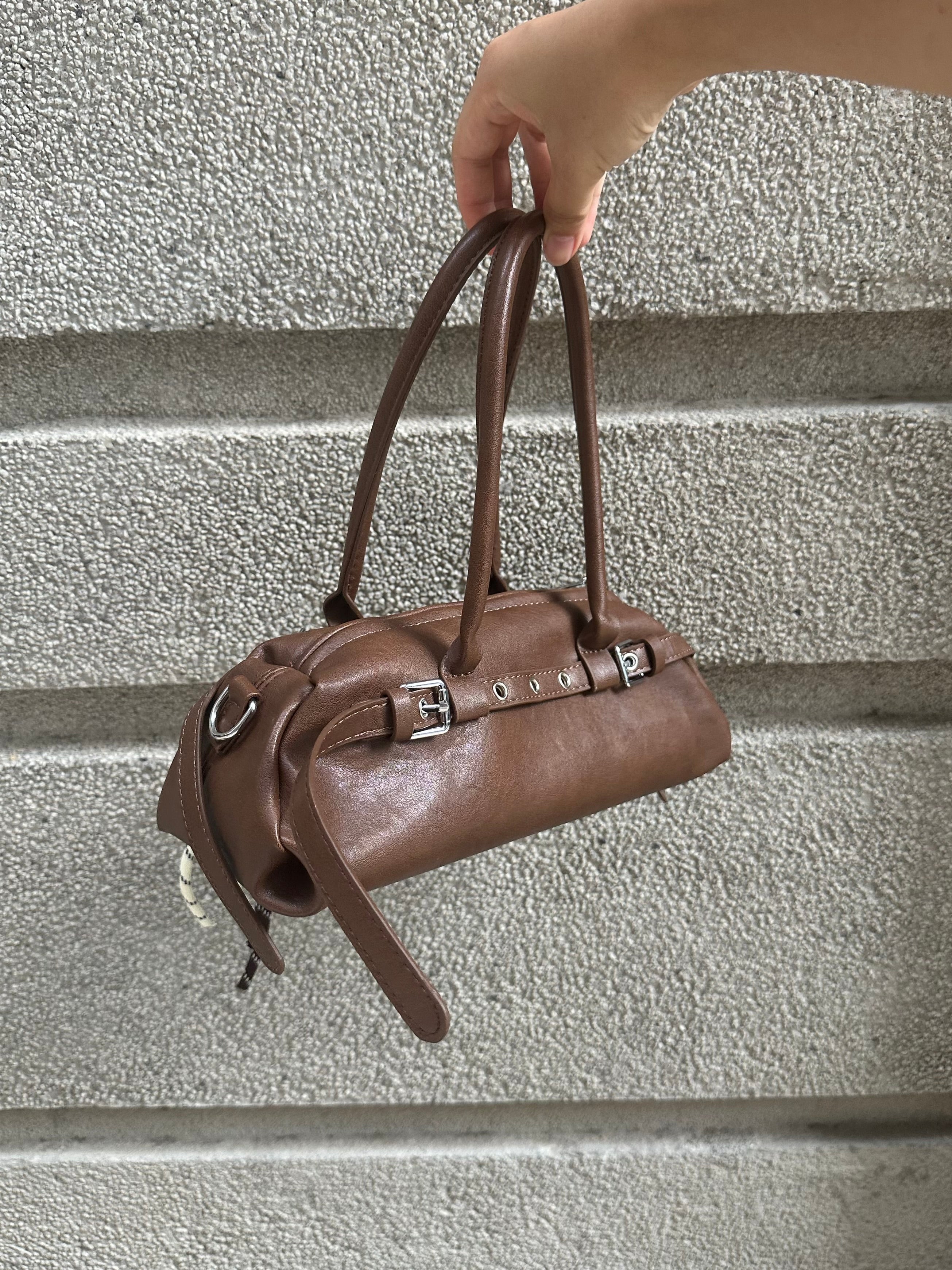 Brown Leather Buckle-Detail Handbag with Rope Charm