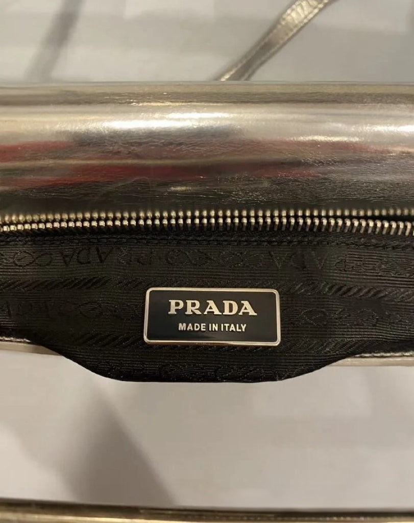 Prada Runway Metallic Silver Leather Shoulder Bag with Sculptural Metal Bar Handle – Futuristic Archive Piece