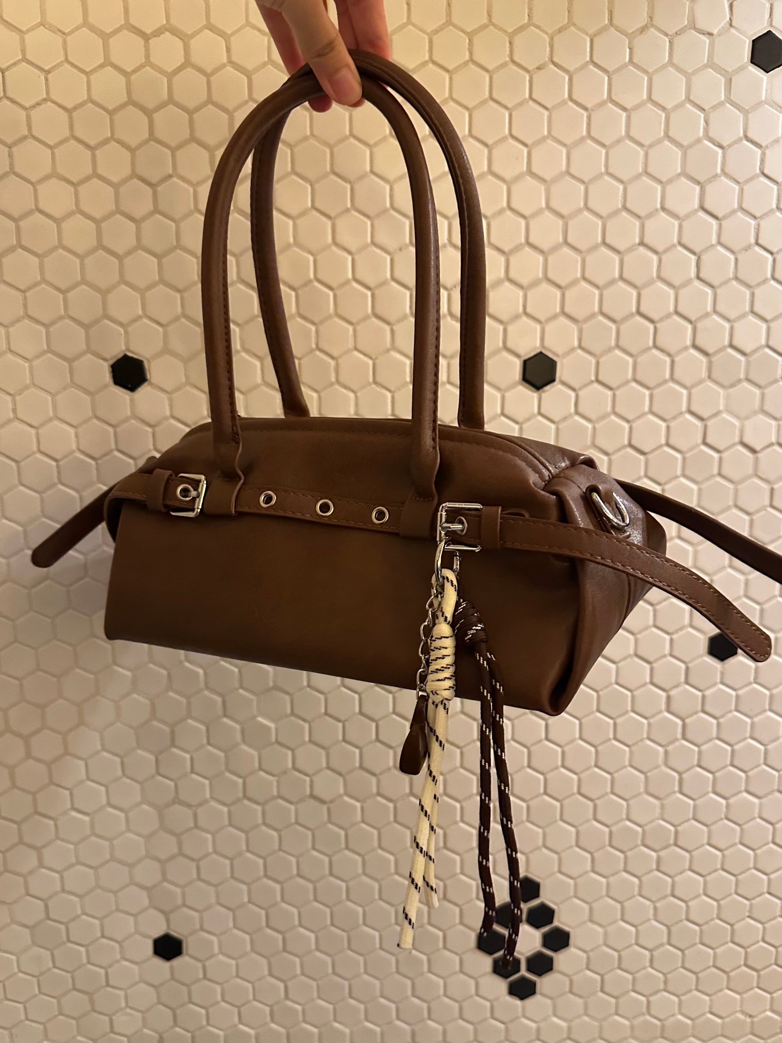 Brown Leather Buckle-Detail Handbag with Rope Charm