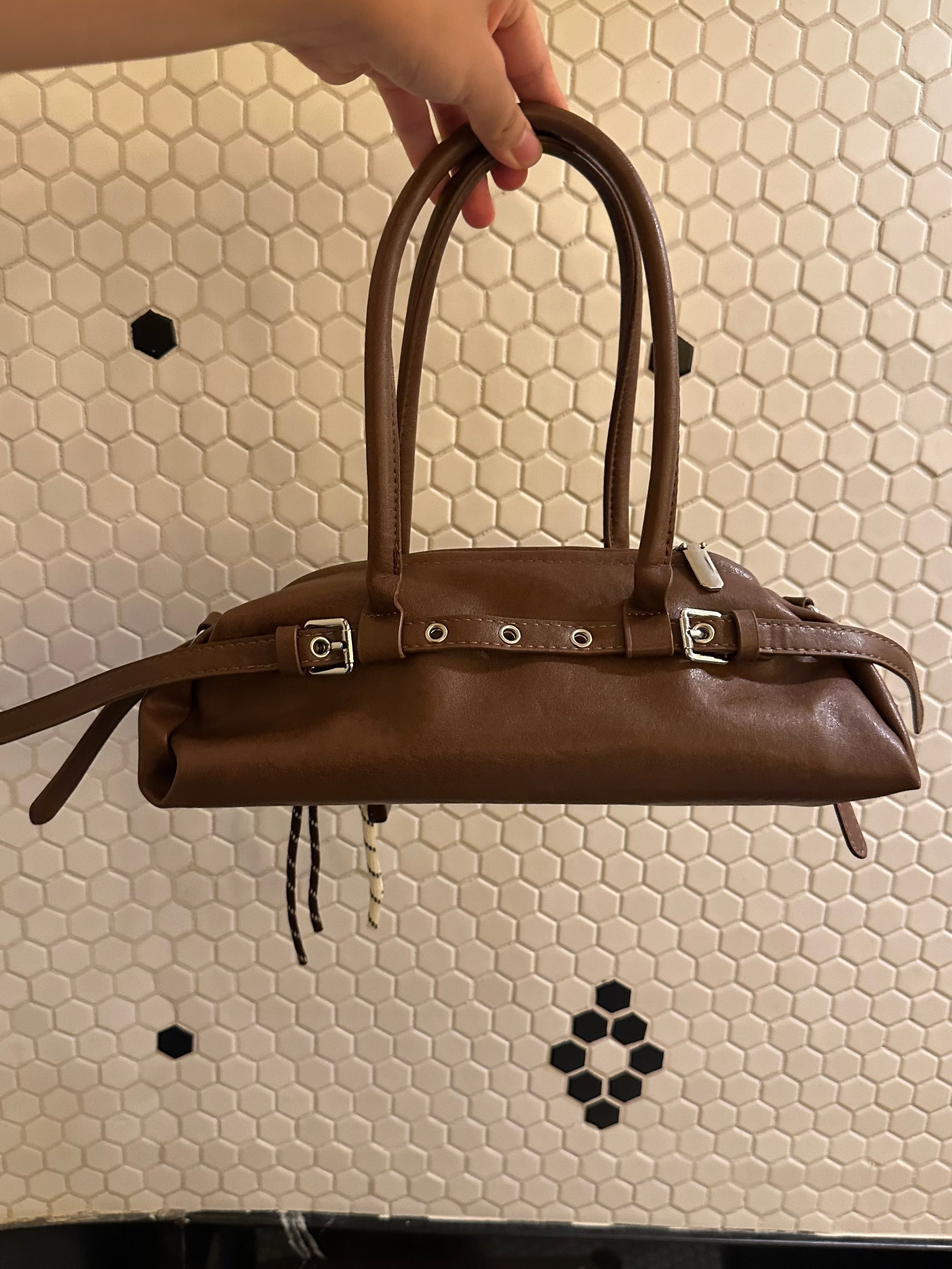 Brown Leather Buckle-Detail Handbag with Rope Charm