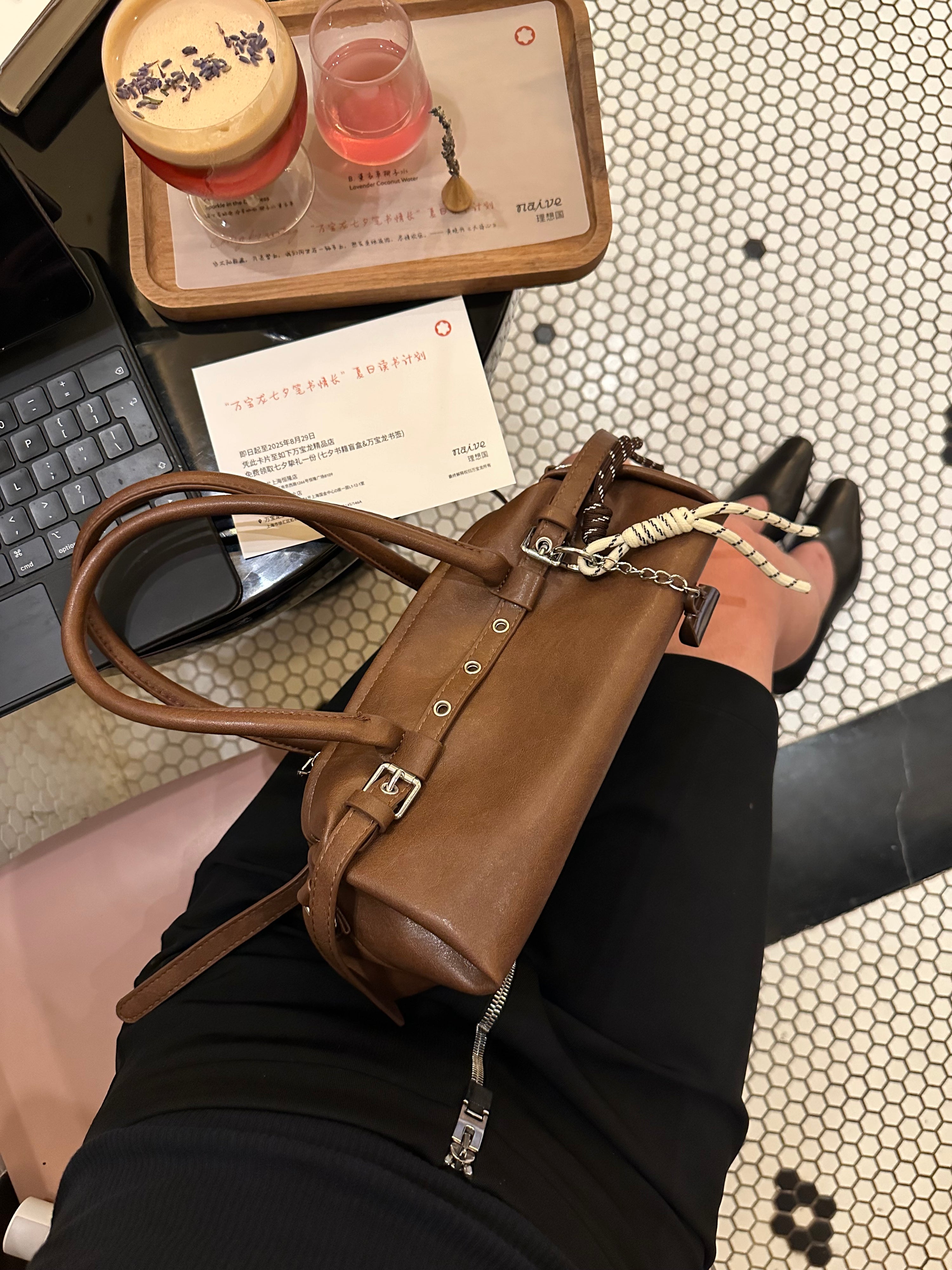 Brown Leather Buckle-Detail Handbag with Rope Charm