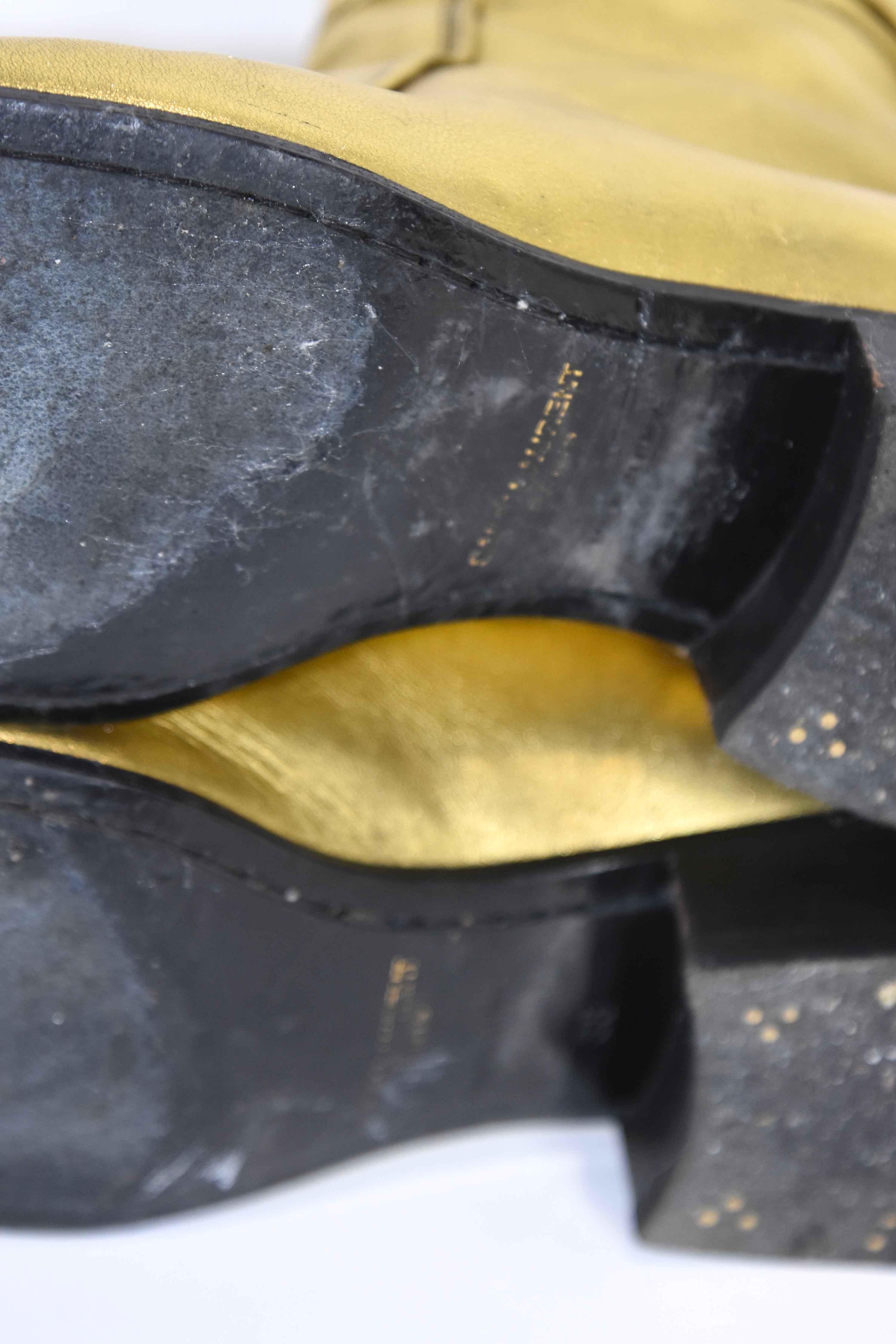 Saint Laurent Gold Sculpted Leather Ankle Boots