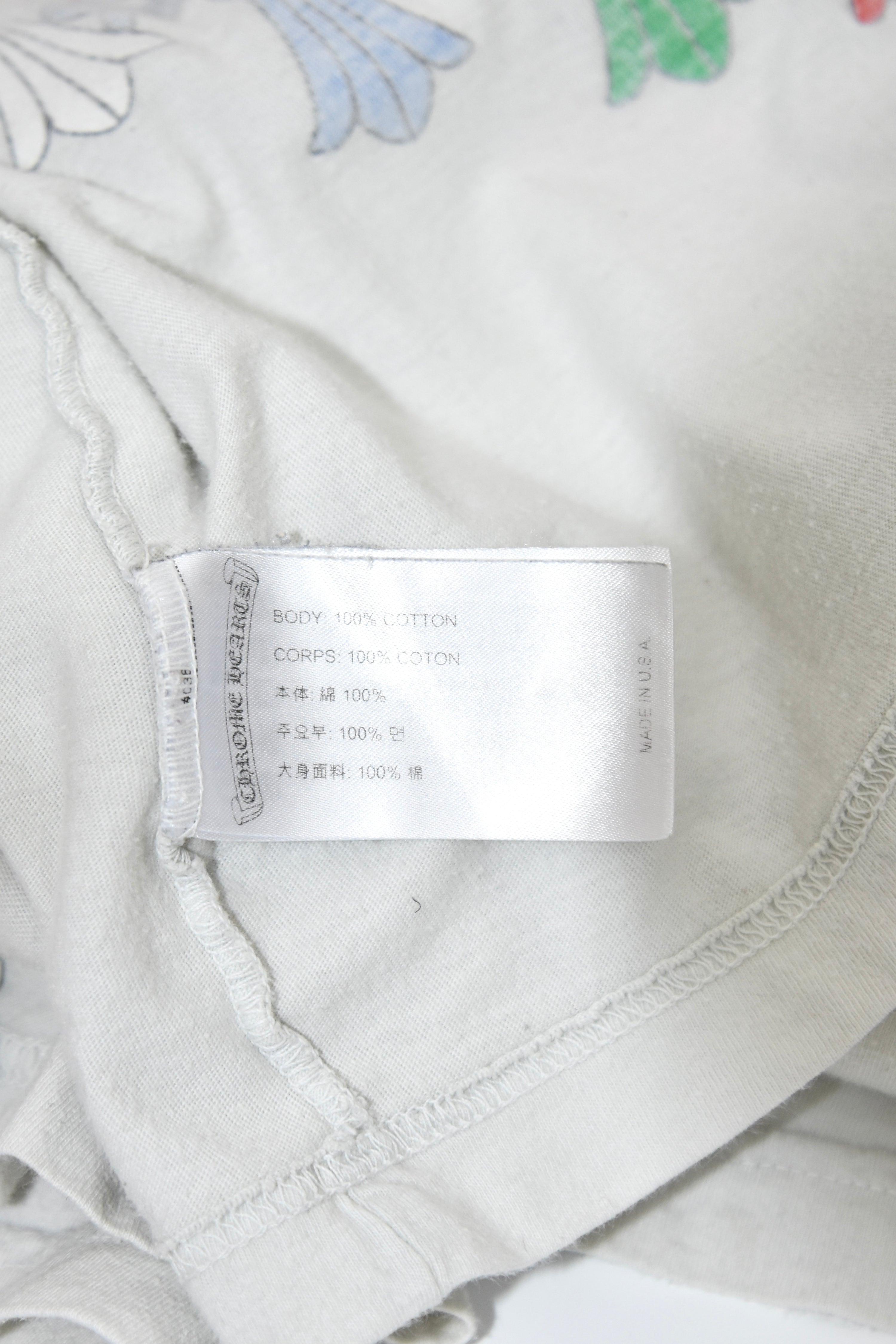 Chrome Hearts Cross Cluster Graphic T-Shirt – White Cotton Pocket Tee with Multicolor Cross Print