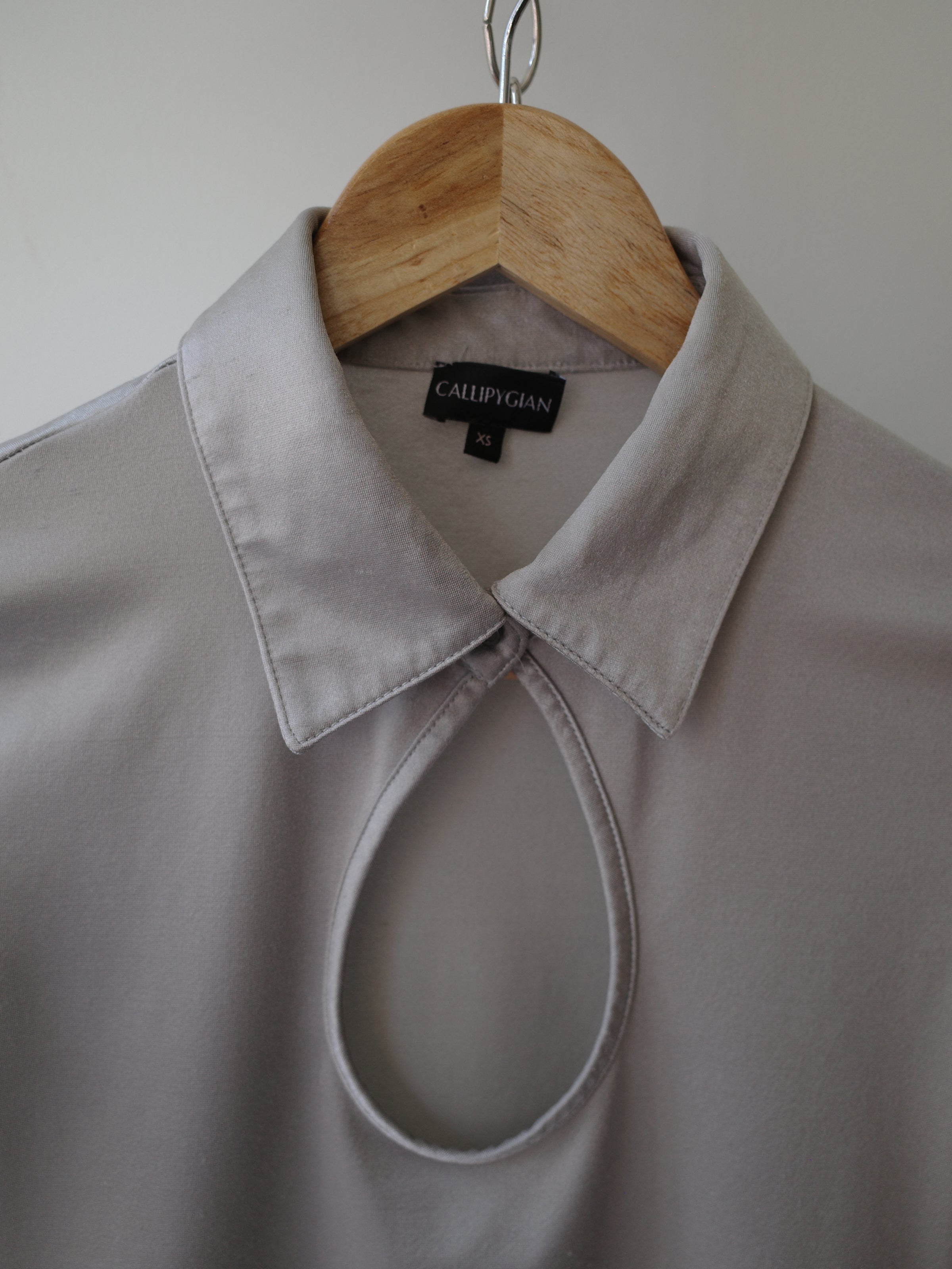 Callipygian Silver Jersey Cutout Top